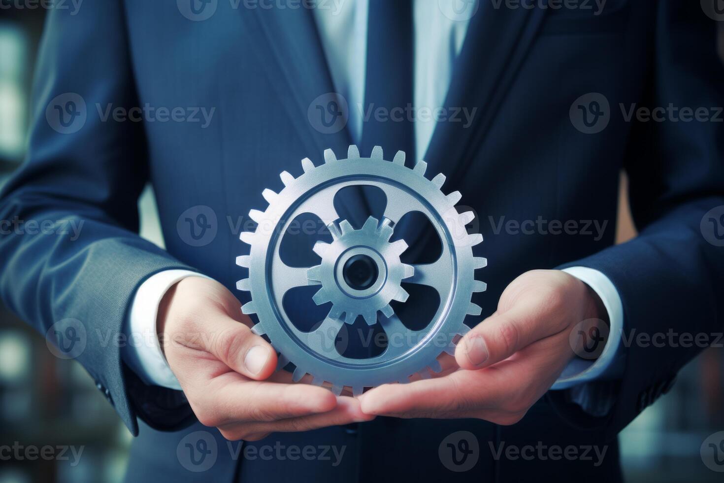 Man holding gear in hands. Teamwork metallic silver equipment industrial progress engineering machine mechanical cog wheel technology steel power transmission motion circle construction photo