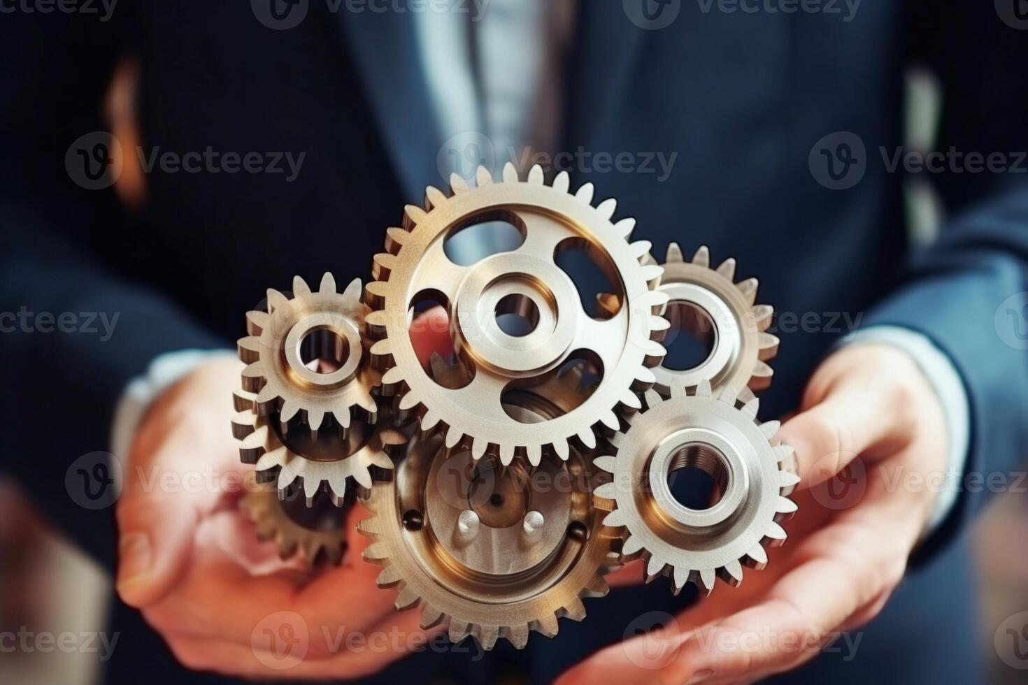 Man holding gear in hands. Teamwork metallic silver equipment industrial progress engineering machine mechanical cog wheel technology steel power transmission motion circle construction photo