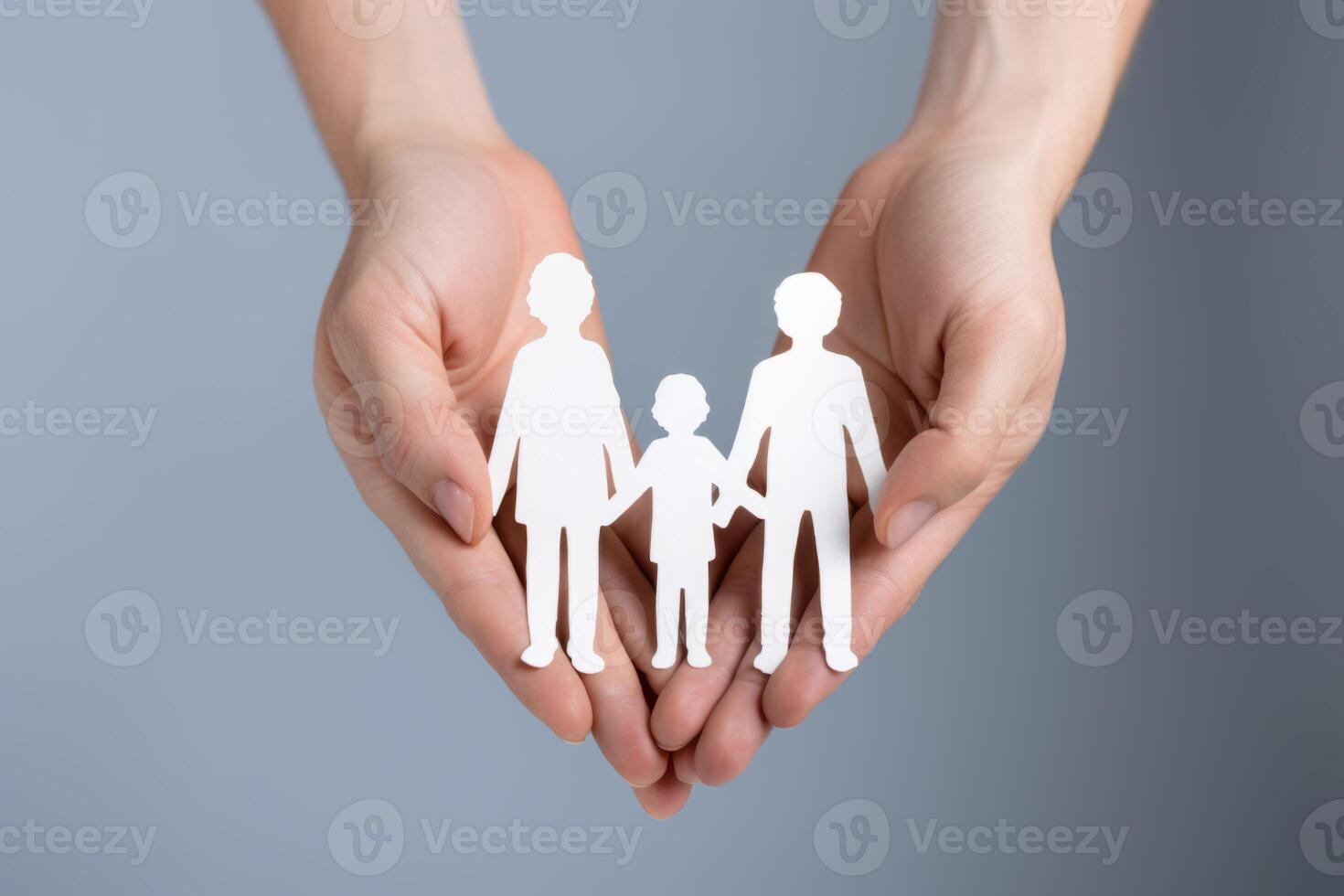 Hand holding paper figures happy family bond concept children health insurance together parents care for child protection safety security community partners silhouette love symbol help photo