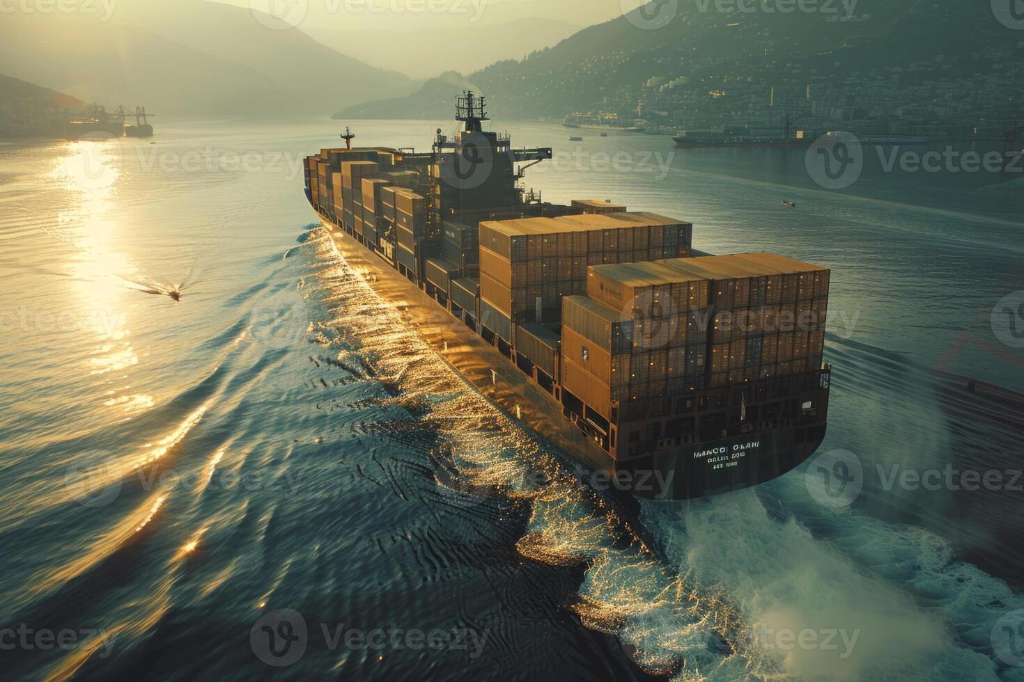 A large cargo ship is sailing through the ocean with the sun setting in the background. The ship is the main focus of the image, and the sun's reflection on the water creates a serene photo