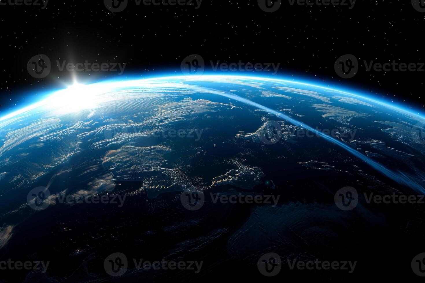 A view of the Earth from space, with a bright blue planet surrounded by a dark sky. The stars are scattered throughout the sky, creating a sense of vastness and wonder photo