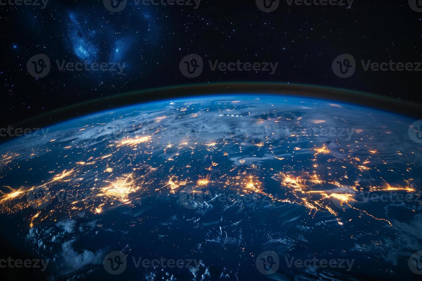 A view of the Earth from space, with a bright blue planet surrounded by a dark sky. The stars are scattered throughout the sky, creating a sense of vastness and wonder photo