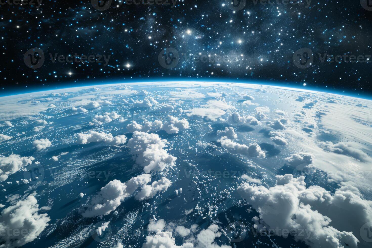 A view of the Earth from space, with a bright blue planet surrounded by a dark sky. The stars are scattered throughout the sky, creating a sense of vastness and wonder photo