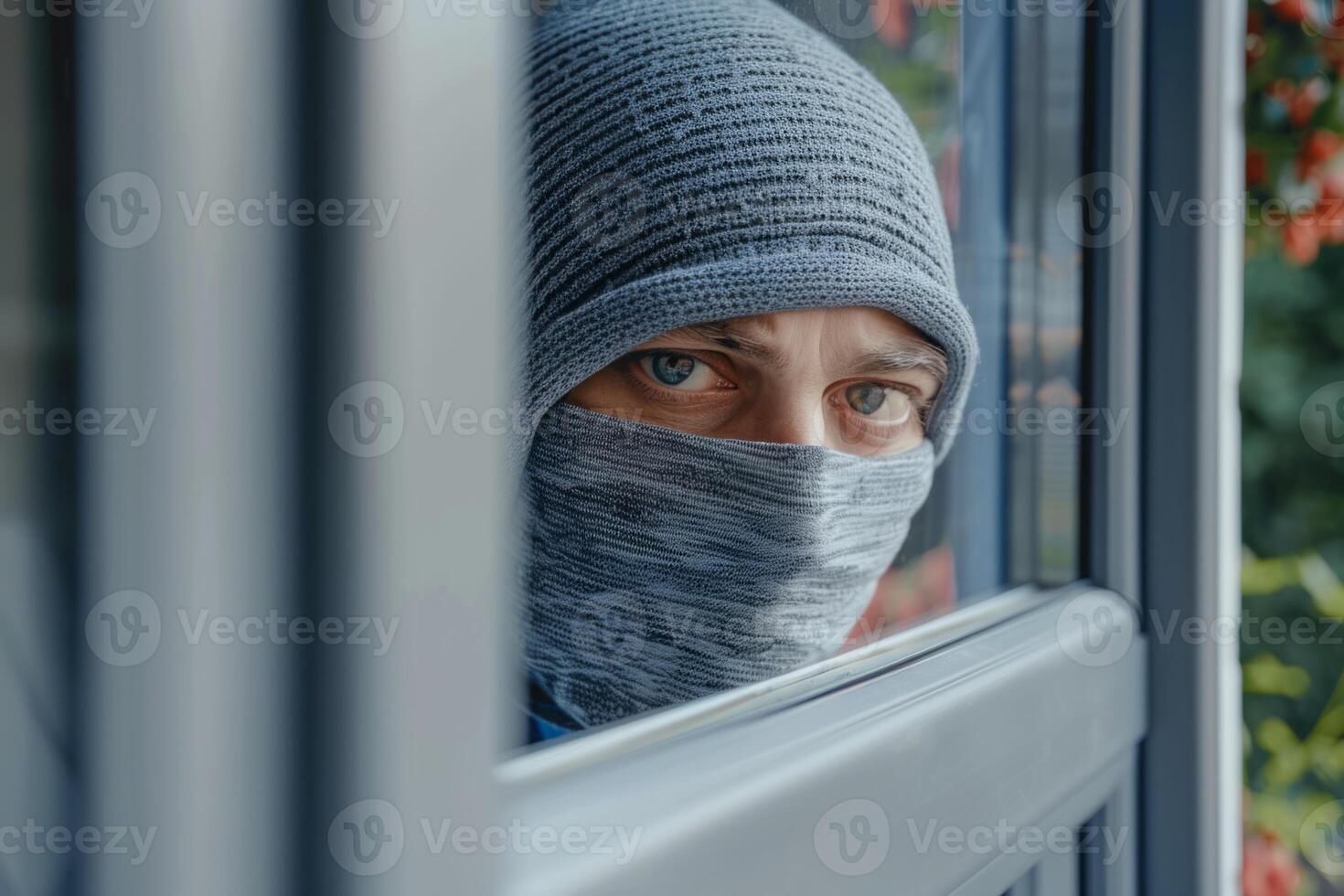 Burglar thief robbing house criminal activity robbery burglary mask crime scene stealing mugger security risk cctv camera catch illegal activity dangerous evil violence gun balaclava photo