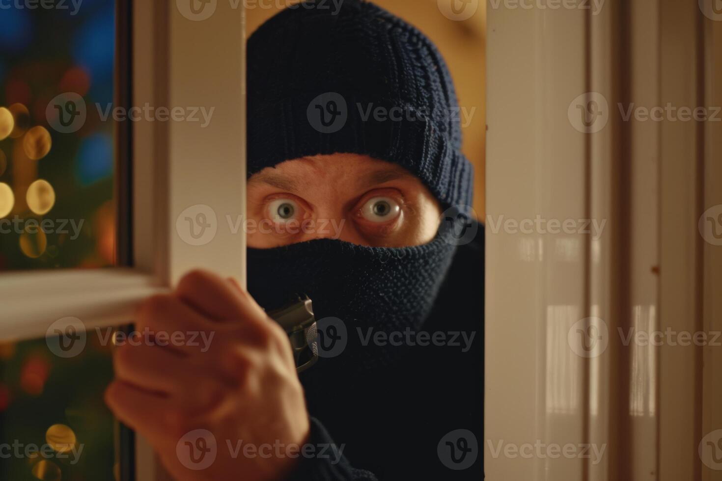 Burglar thief robbing house criminal activity robbery burglary mask crime scene stealing mugger security risk cctv camera catch illegal activity dangerous evil violence gun balaclava photo