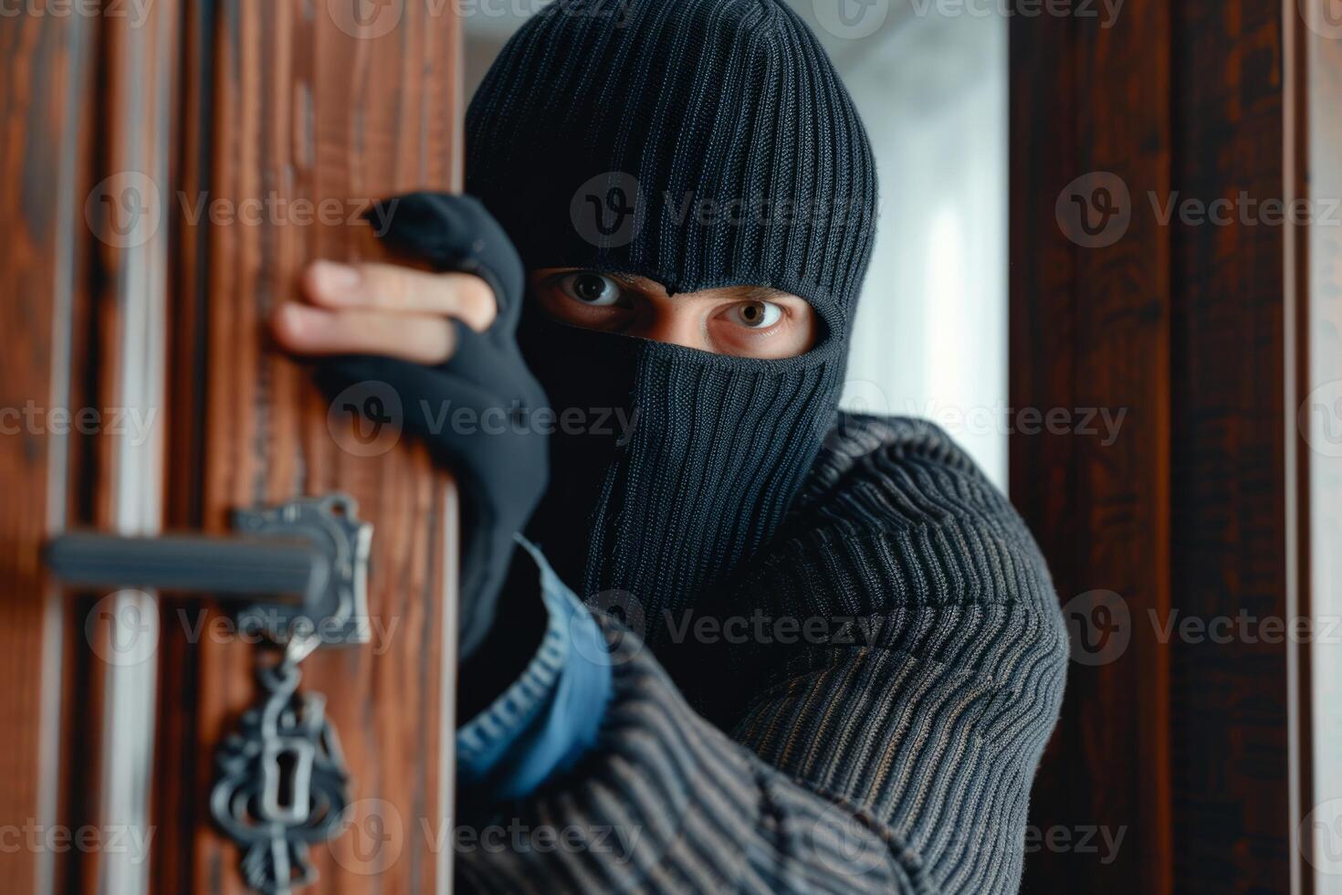 Burglar thief robbing house criminal activity robbery burglary mask crime scene stealing mugger security risk cctv camera catch illegal activity dangerous evil violence gun balaclava photo