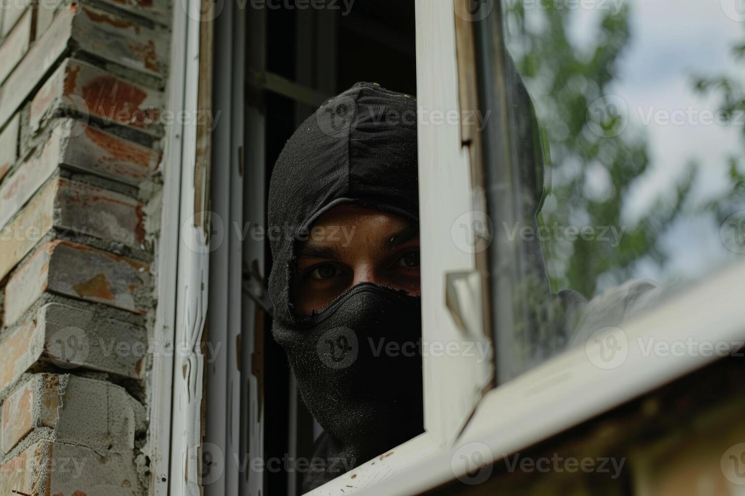 Burglar thief robbing house criminal activity robbery burglary mask crime scene stealing mugger security risk cctv camera catch illegal activity dangerous evil violence gun balaclava photo