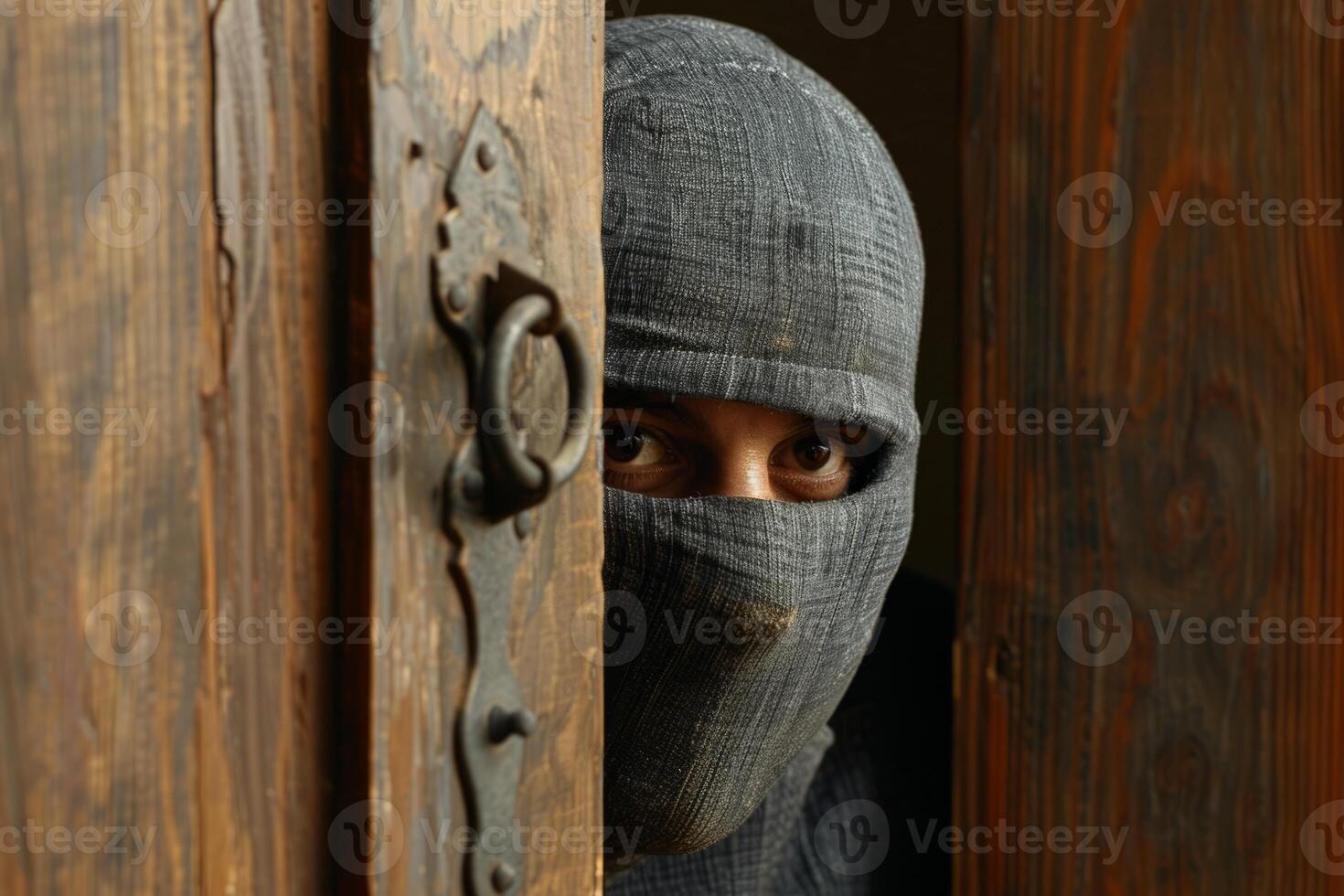 Burglar thief robbing house criminal activity robbery burglary mask crime scene stealing mugger security risk cctv camera catch illegal activity dangerous evil violence gun balaclava photo