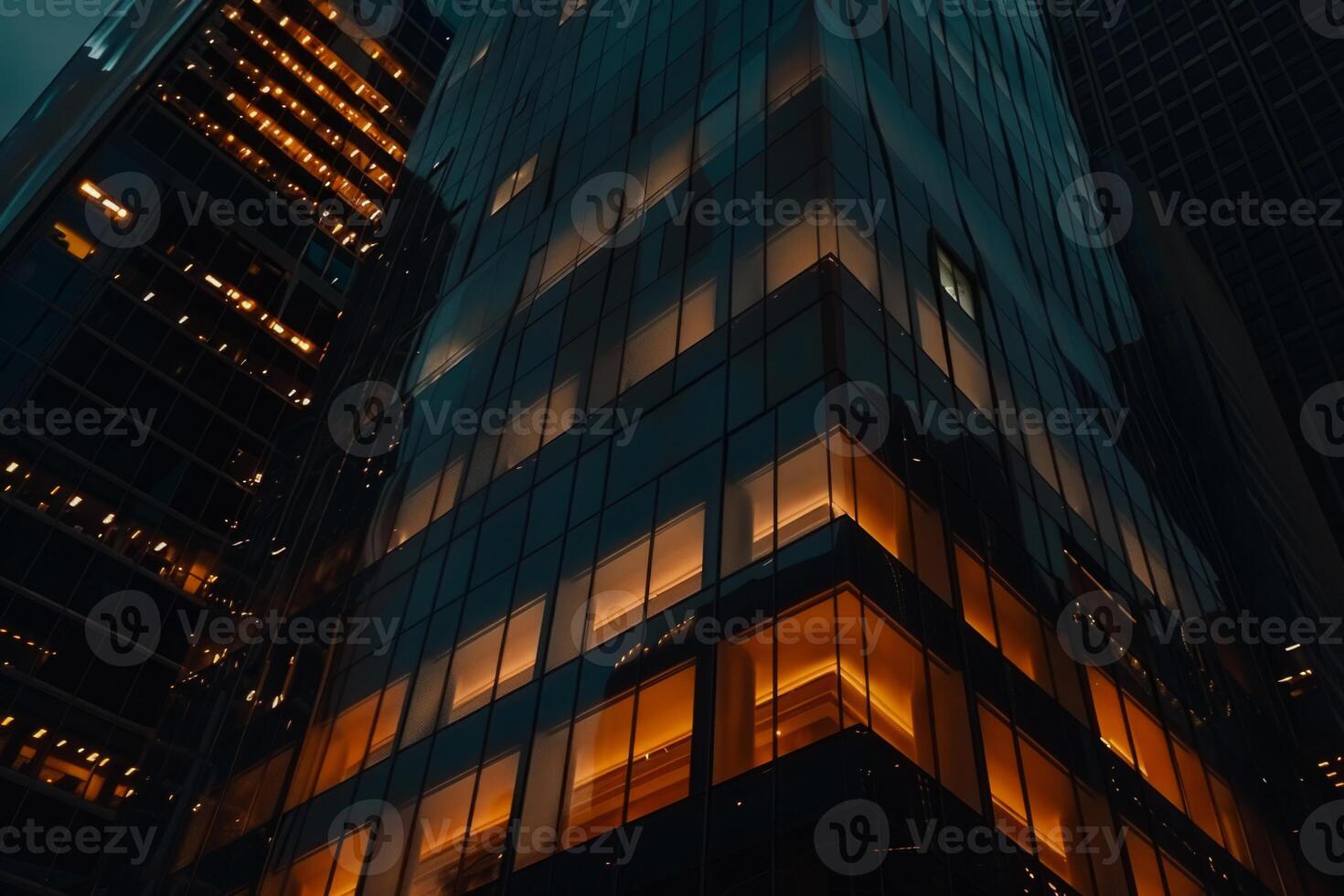 Modern office building windows lit in evening night early morning long working hours exhaustion overtime exterior urban architecture skyscraper lights tower financial sector banking hq photo
