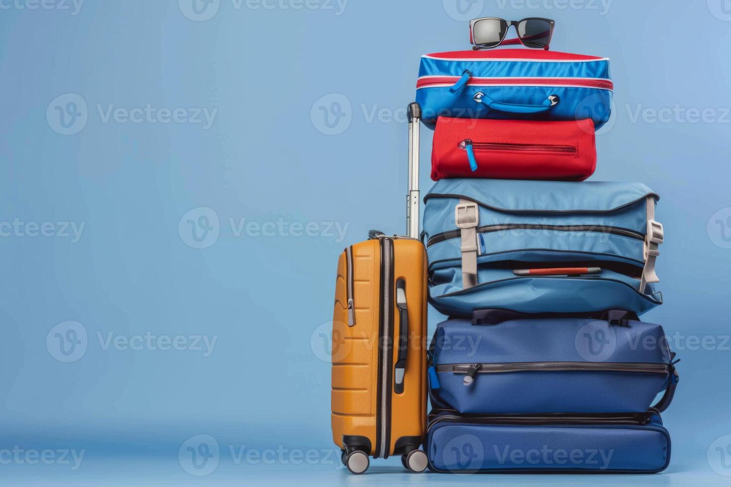 Tourist travel bags on a simple background summer season holiday vacation travelling exploring cultures countries luggage baggage travel agency trip journey tour concept sunbathing beach photo