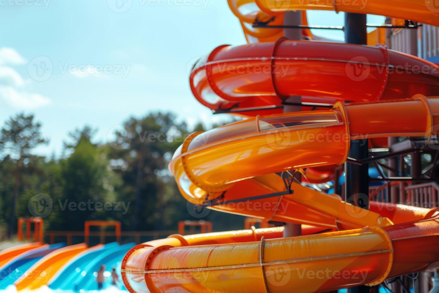Water slide amusement park tourist attraction summer kids festivity festival joy pool with blue clear water vacation leisure time aquapark fast sliding pipes colorful resort entertainment photo