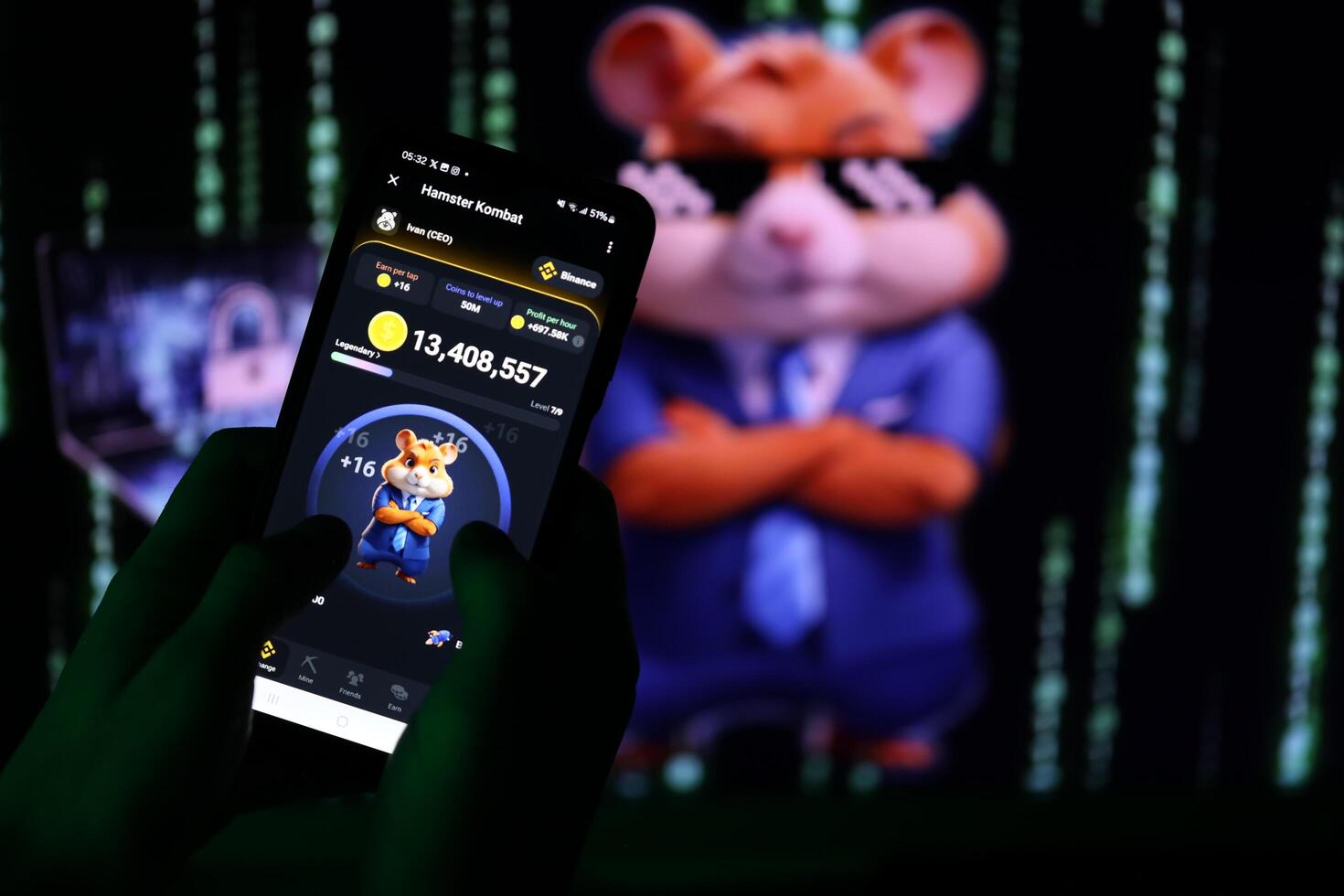 KYIV, UKRAINE - APRIL 20, 2024 Hamster Kombat telegram bot on smartphone screen. Hamster Kombat is a viral Telegram-based crypto game for earn HMSTR tokens by managing virtual crypto exchange photo