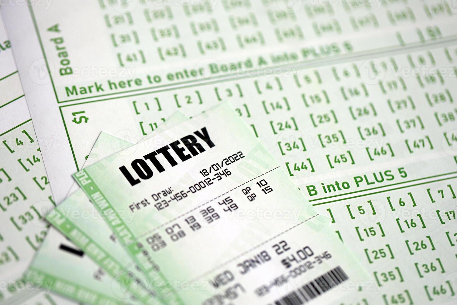 Green lottery tickets and blank bills with numbers for playing lottery photo