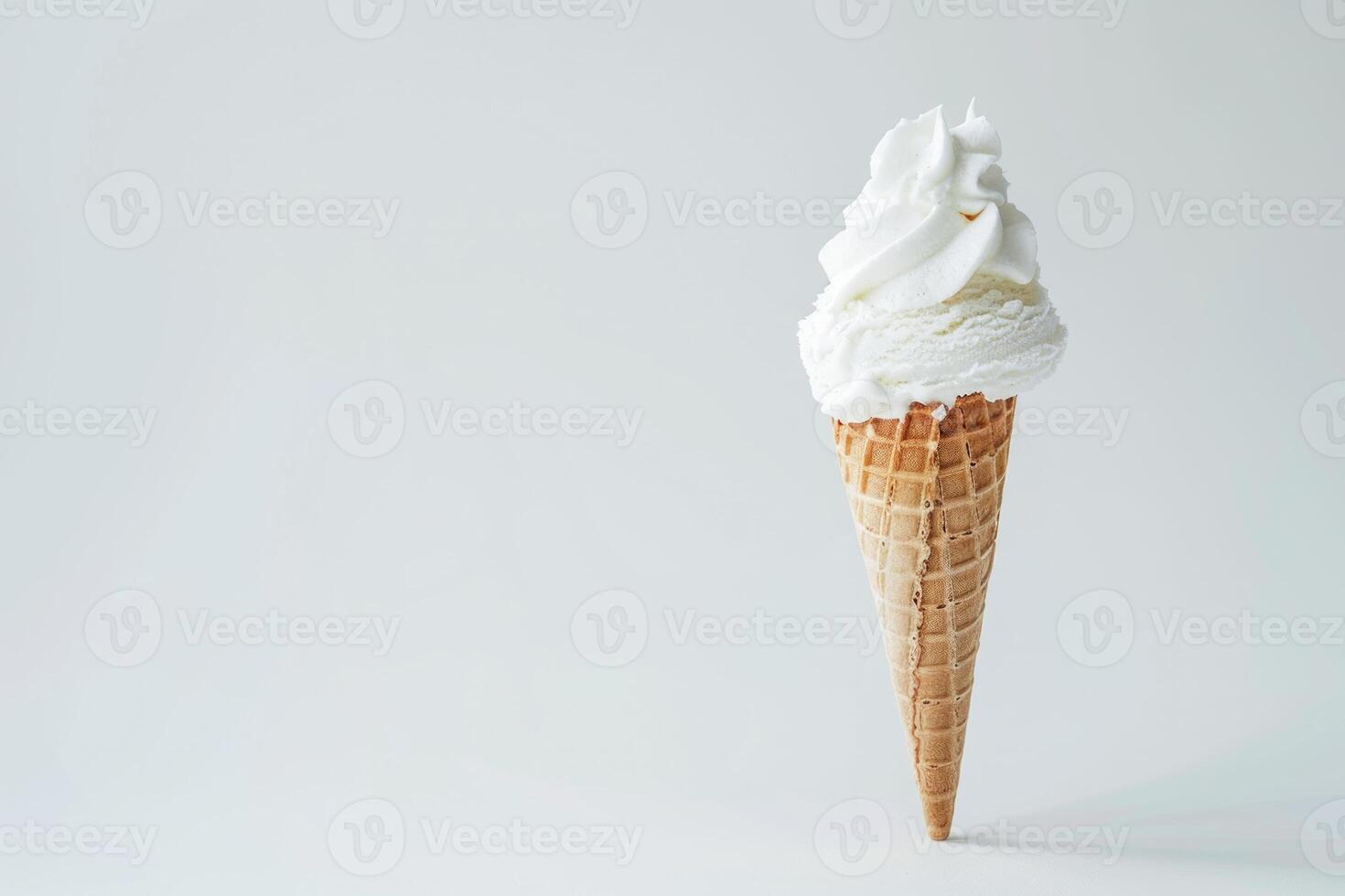 Vanilla Soft Serve Ice Cream Cone Against a Clean Background photo