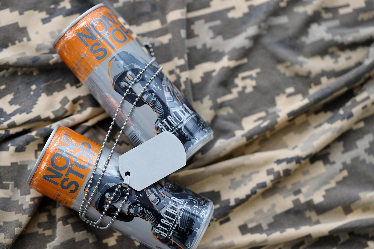 KYIV, UKRAINE - OCTOBER 31, 2023 Non Stop energy drink with limited edition design of Stalker and character with gas mask on aluminium tin can photo