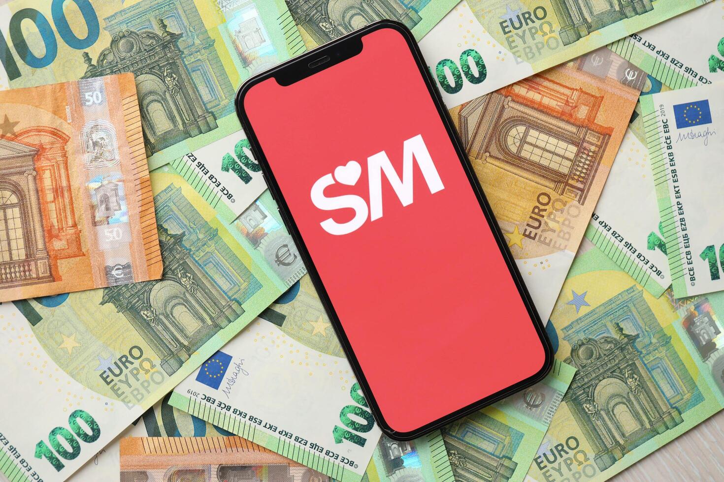 KYIV, UKRAINE - FEBRUARY 23, 2024 Senior Match logo of famous dating website or app on iPhone display photo