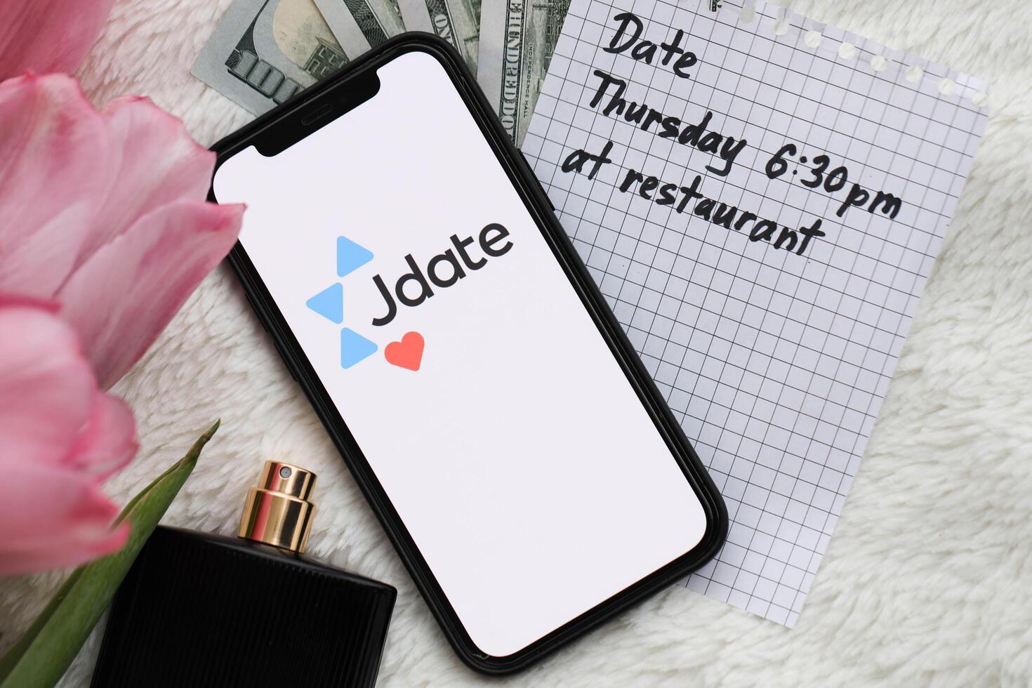 KYIV, UKRAINE - FEBRUARY 23, 2024 Jdate logo of famous dating website or app on iPhone display photo