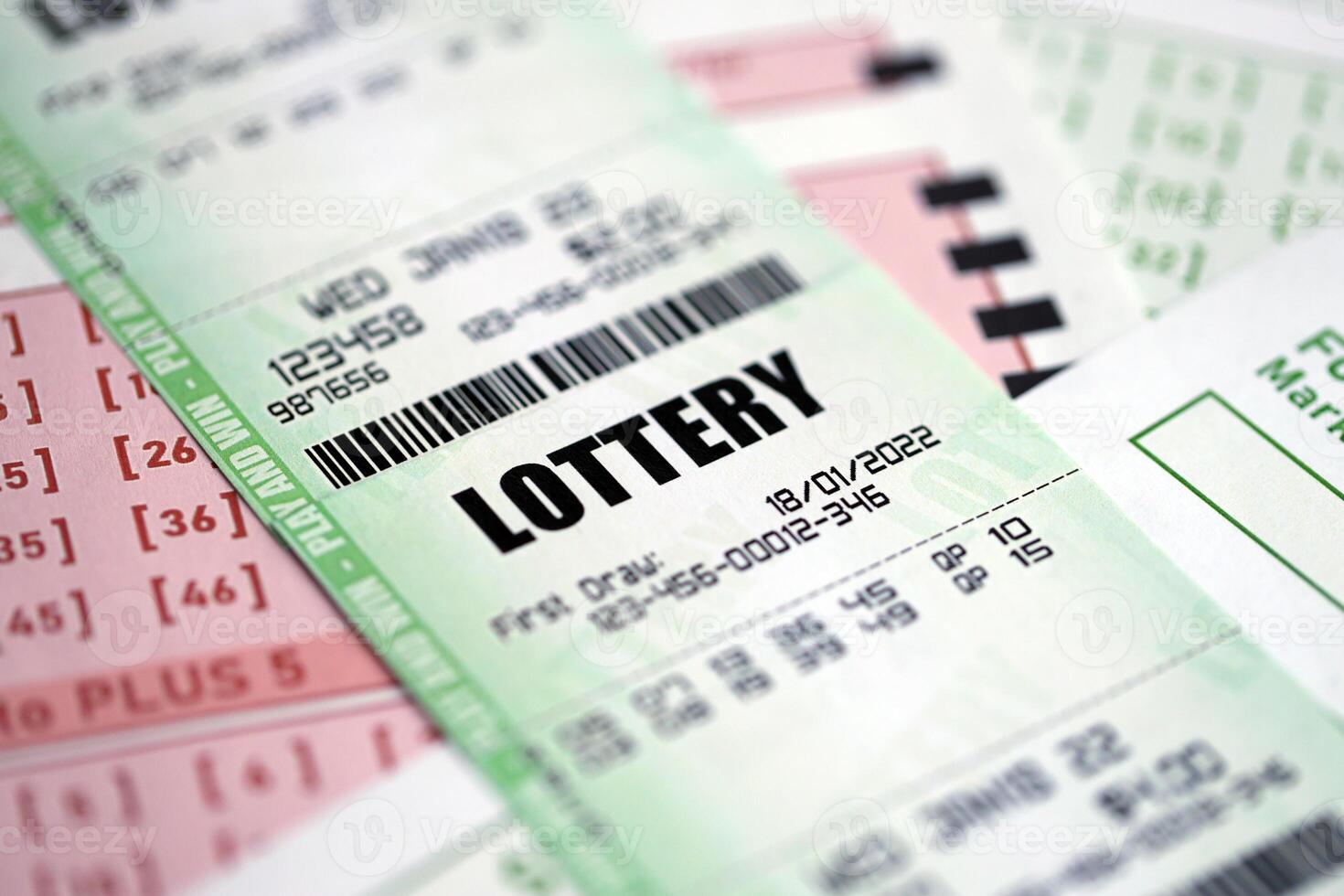 Green and red lottery tickets on blank bills with numbers for playing lottery photo