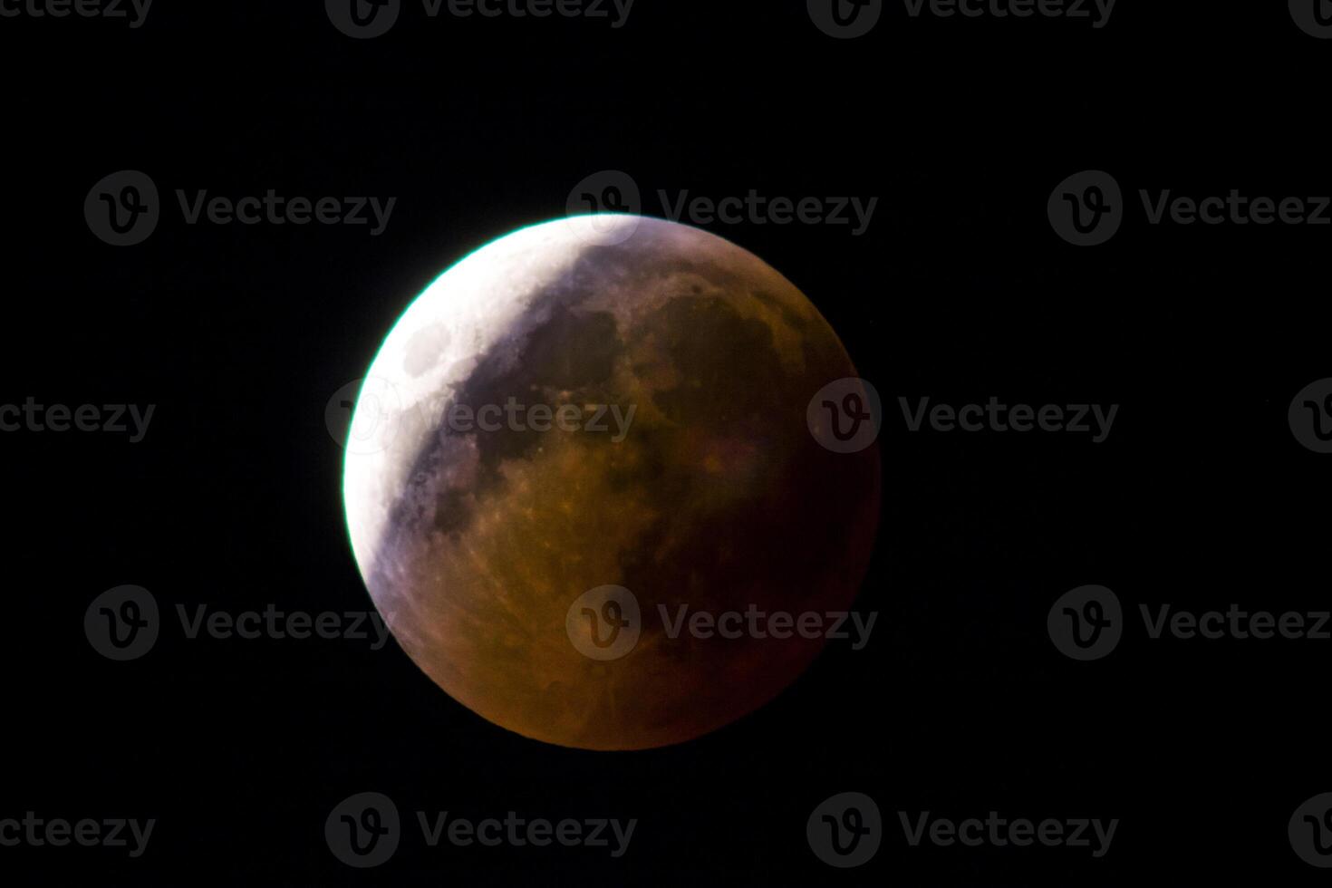 Partial lunar eclipse from Iraq with dark photo