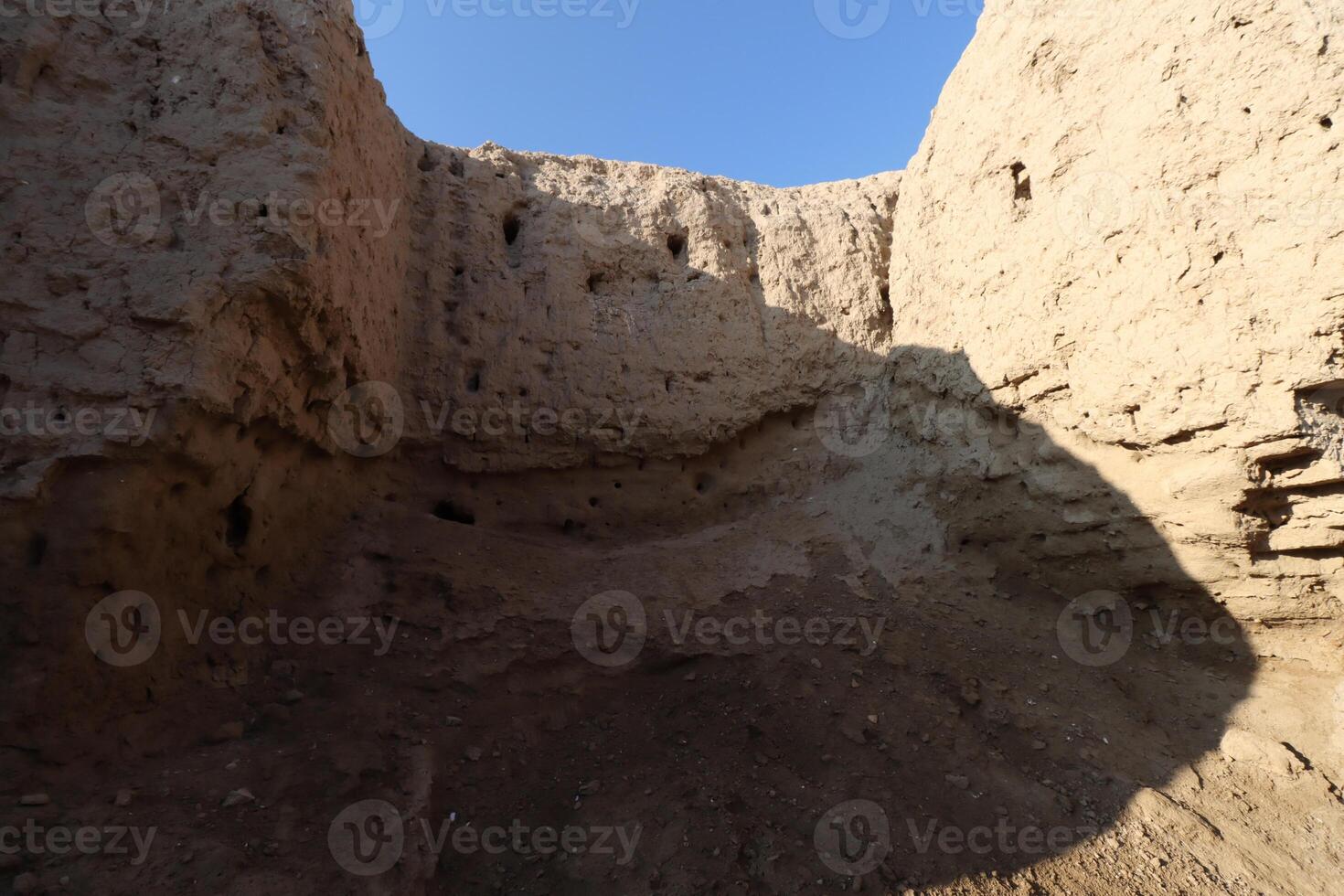 Ancient city of kish , 3100 bc , al, ahmar hill in Babylon in Iraq , ancient ruins with blue sky photo