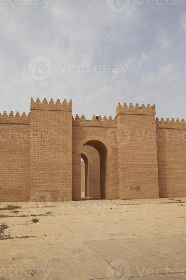 ancient city of Babylon in Iraq , ancient ruins , southern palace , old palace with blue sky photo