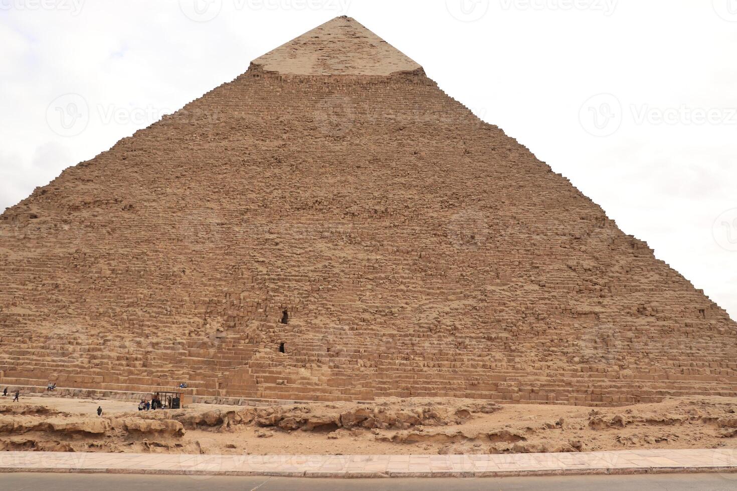 the pyramids of egypt , the pyramid of khufu is the largest pyramid in giza governorate photo