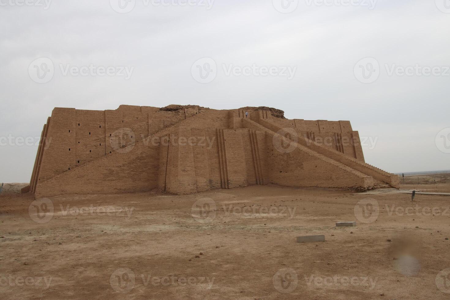 Ziggurat of ur in Iraq with cloudy sky photo