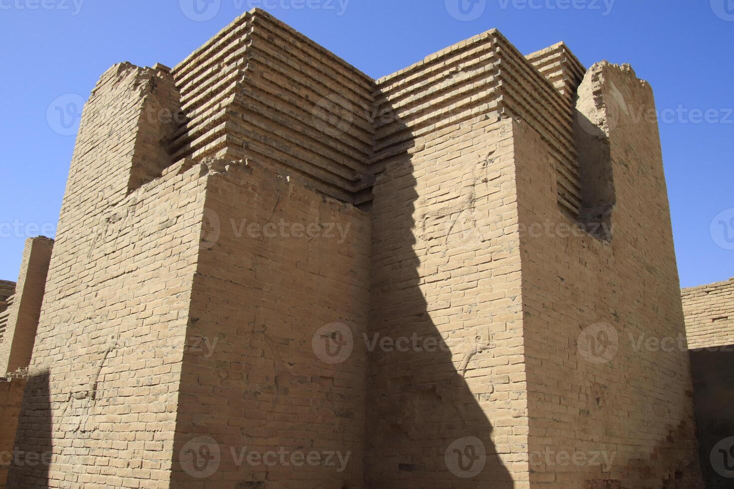 Ishtar gate in Babylon with blue sky photo