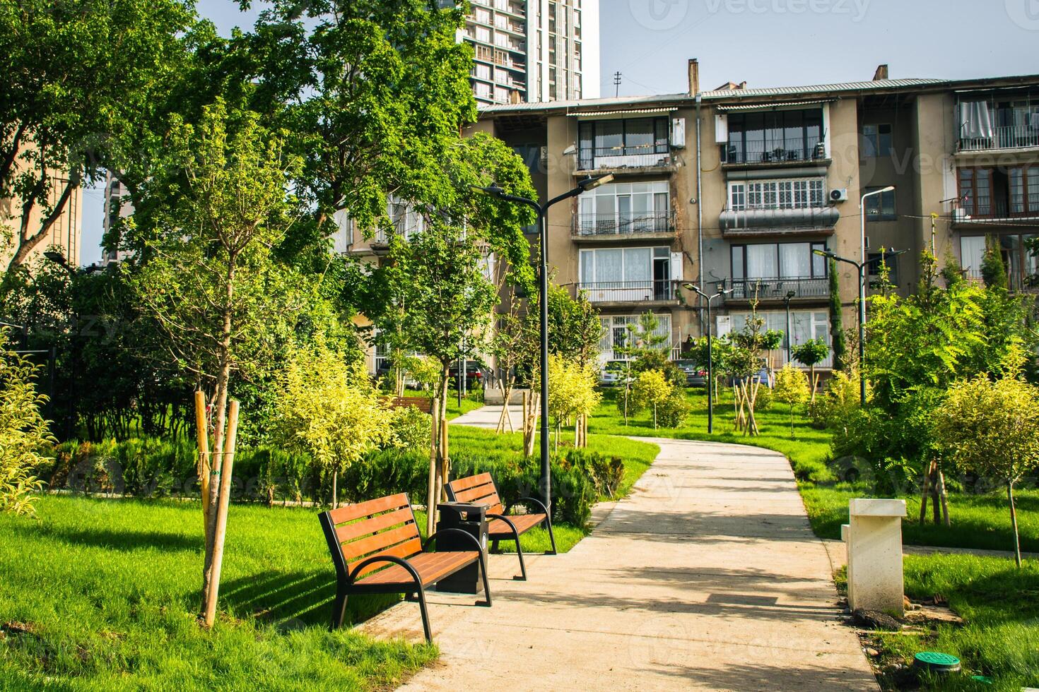 Tbilisi, Georgia - 1st june, 2024 - new green park area with paths and benches in Saburtalo district, Tbilisi photo