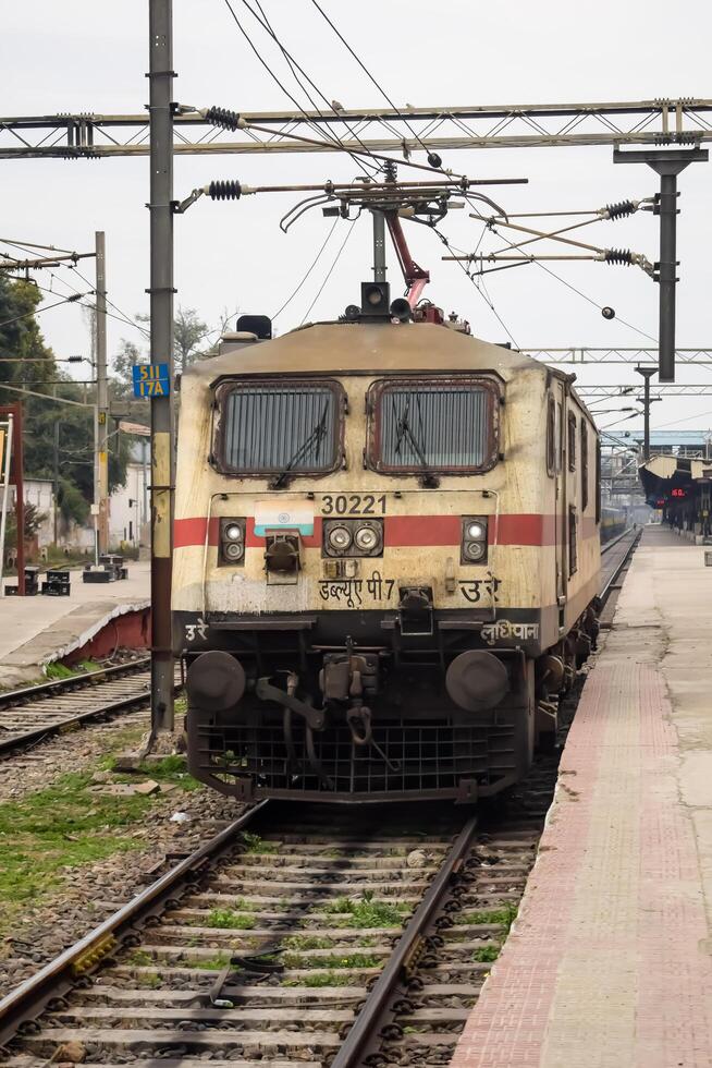 Amritsar, India, June 03 2024 - Indian train electric locomotive engine at Amritsar railway station during the day time, Amritsar Shatabdi train electrical locomotive engine photo