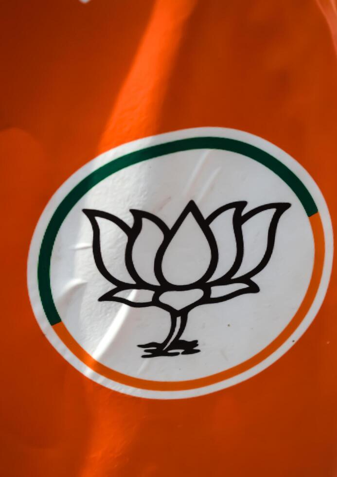 New Delhi, India - May 23 2024 - Bharatiya Janata Party Logo of Indian political party, BJP Bhartiya Janta Party Symbol during PM road show in Delhi, India, BJP Sign and Symbol photo