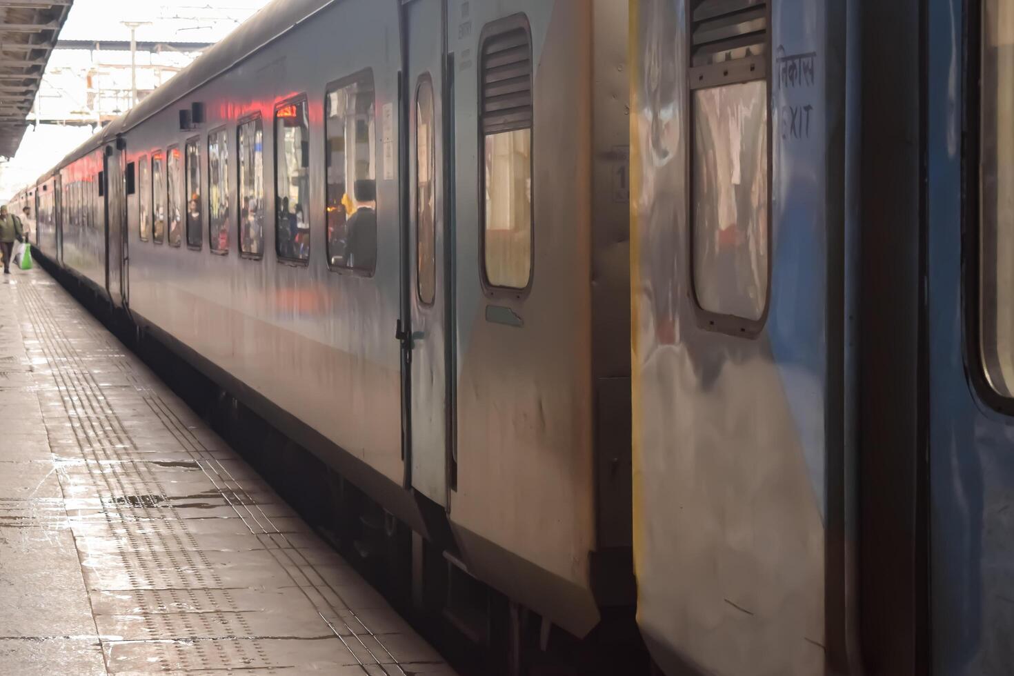 Amritsar, India, May 03 2024 - Indian railway train at Amritsar railway station platform during morning time, Colourful train at Amritsar, Punjab railway station photo