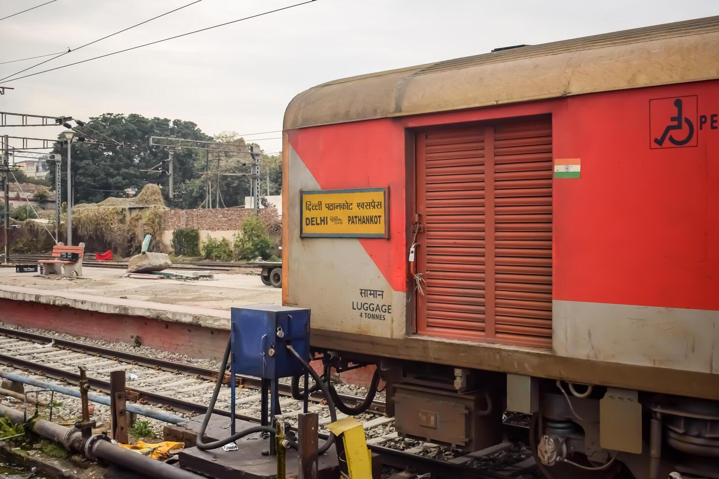 Amritsar, India, May 03 2024 - Indian railway train at Amritsar railway station platform during morning time, Colourful train at Amritsar, Punjab railway station photo