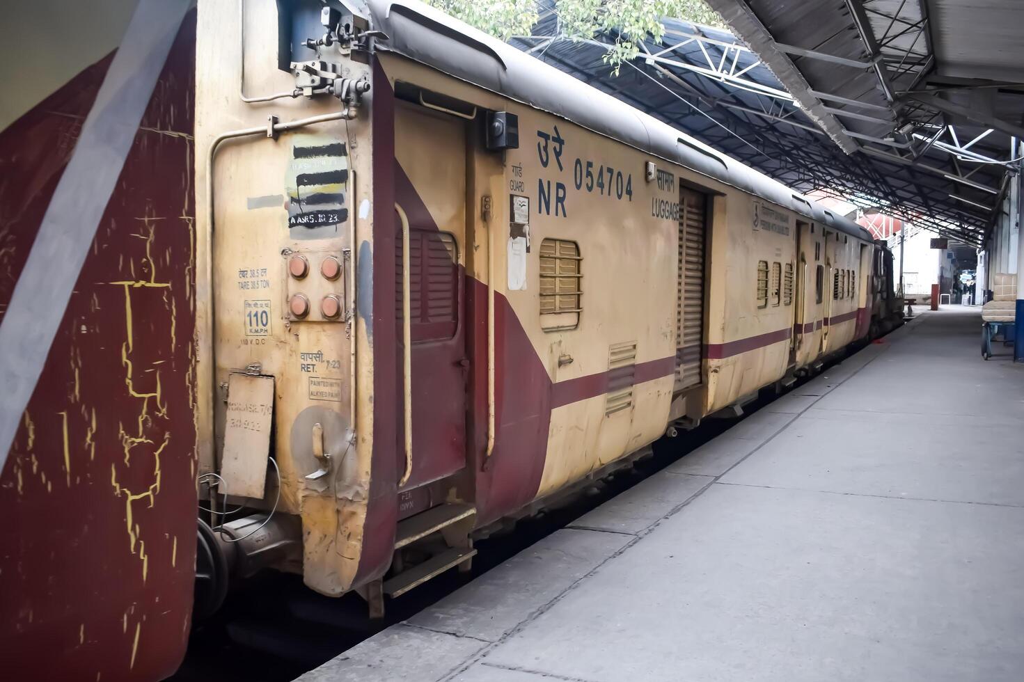 Amritsar, India, May 03 2024 - Indian railway train at Amritsar railway station platform during morning time, Colourful train at Amritsar, Punjab railway station photo