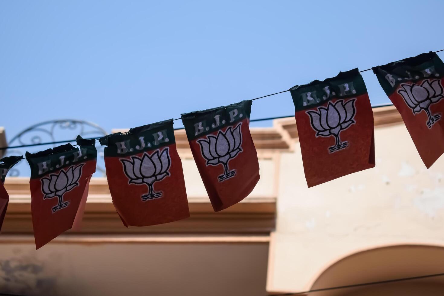 New Delhi, India - May 23 2024 - Bharatiya Janata Party Logo of Indian political party, BJP Bhartiya Janta Party Symbol during PM road show in Delhi, India, BJP Sign and Symbol photo