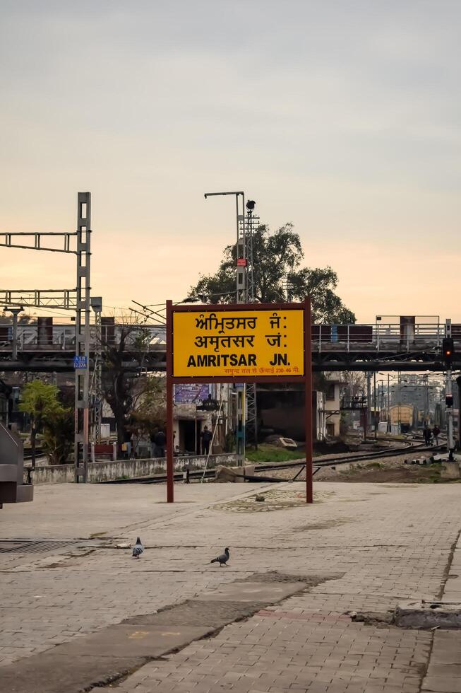 Amritsar, India, May 03 2024 - Amritsar railway station platform during morning time, Amritsar Railway station banner at Amritsar, Punjab railway station photo