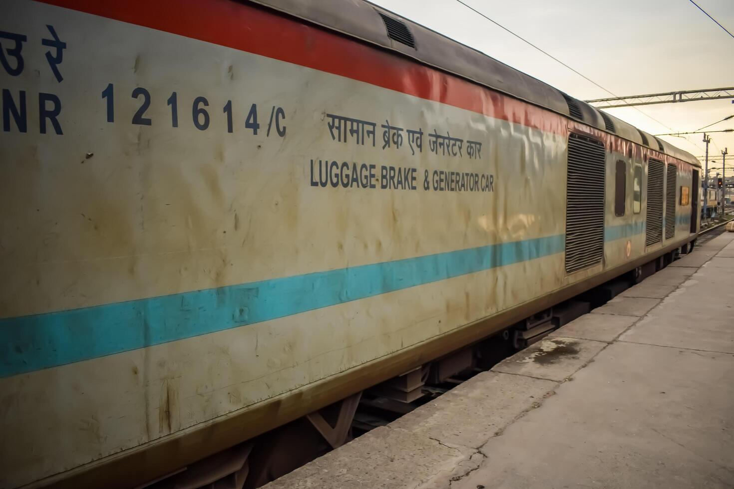 Amritsar, India, May 03 2024 - Indian railway train at Amritsar railway station platform during morning time, Colourful train at Amritsar, Punjab railway station photo