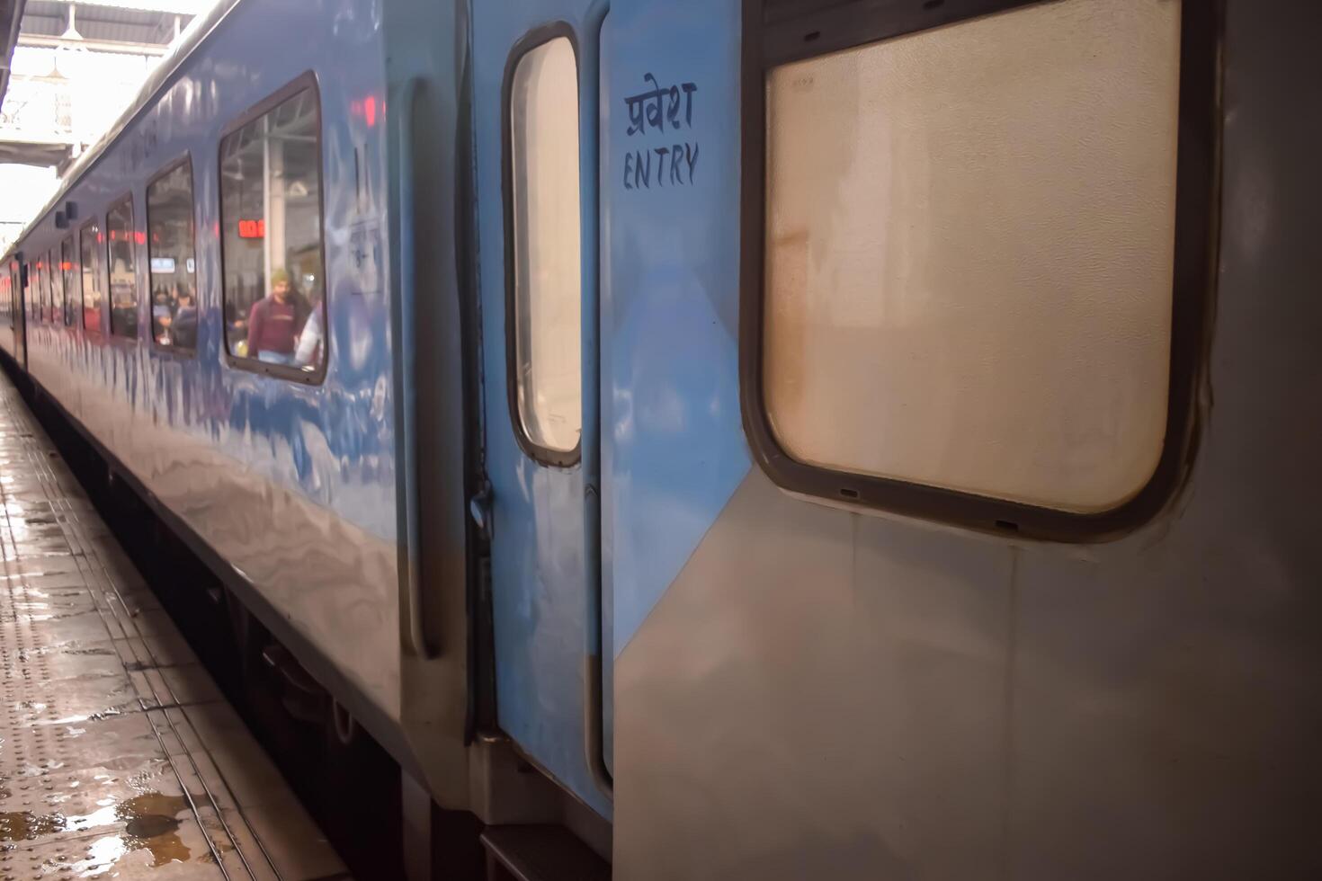 Amritsar, India, May 10 2024 - Indian railway train at Amritsar railway station platform during morning time, Colourful train at Amritsar, Punjab railway station photo