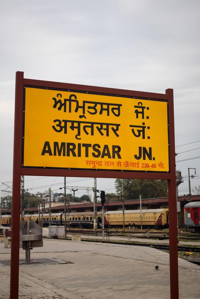 Amritsar, India, May 03 2024 - Amritsar railway station platform during morning time, Amritsar Railway station banner at Amritsar, Punjab railway station photo