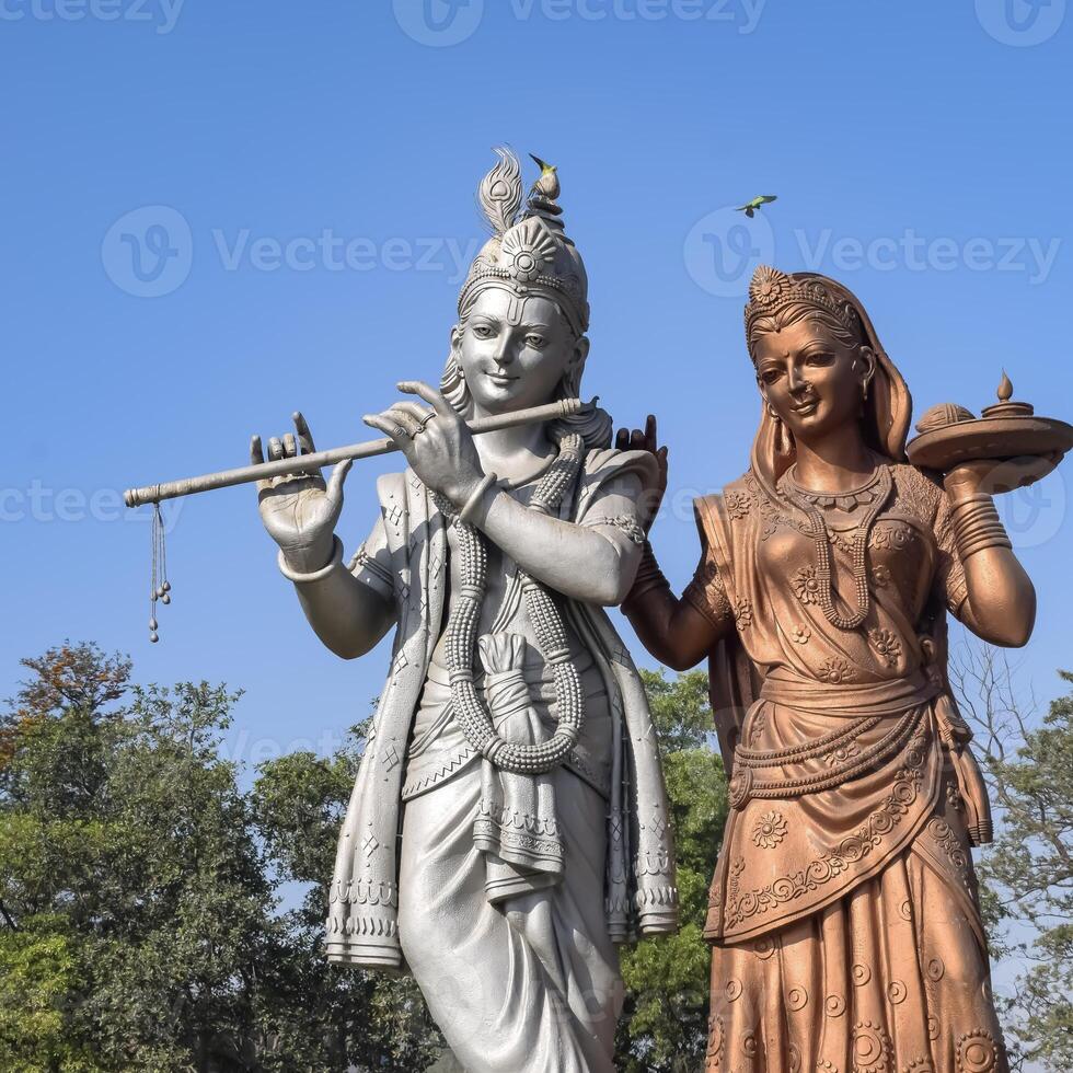 Big statue of Lord Radha Krishna near Delhi International airport, Delhi, India, Lord Krishna and Radha big statue touching sky at main highway Mahipalpur, Delhi photo