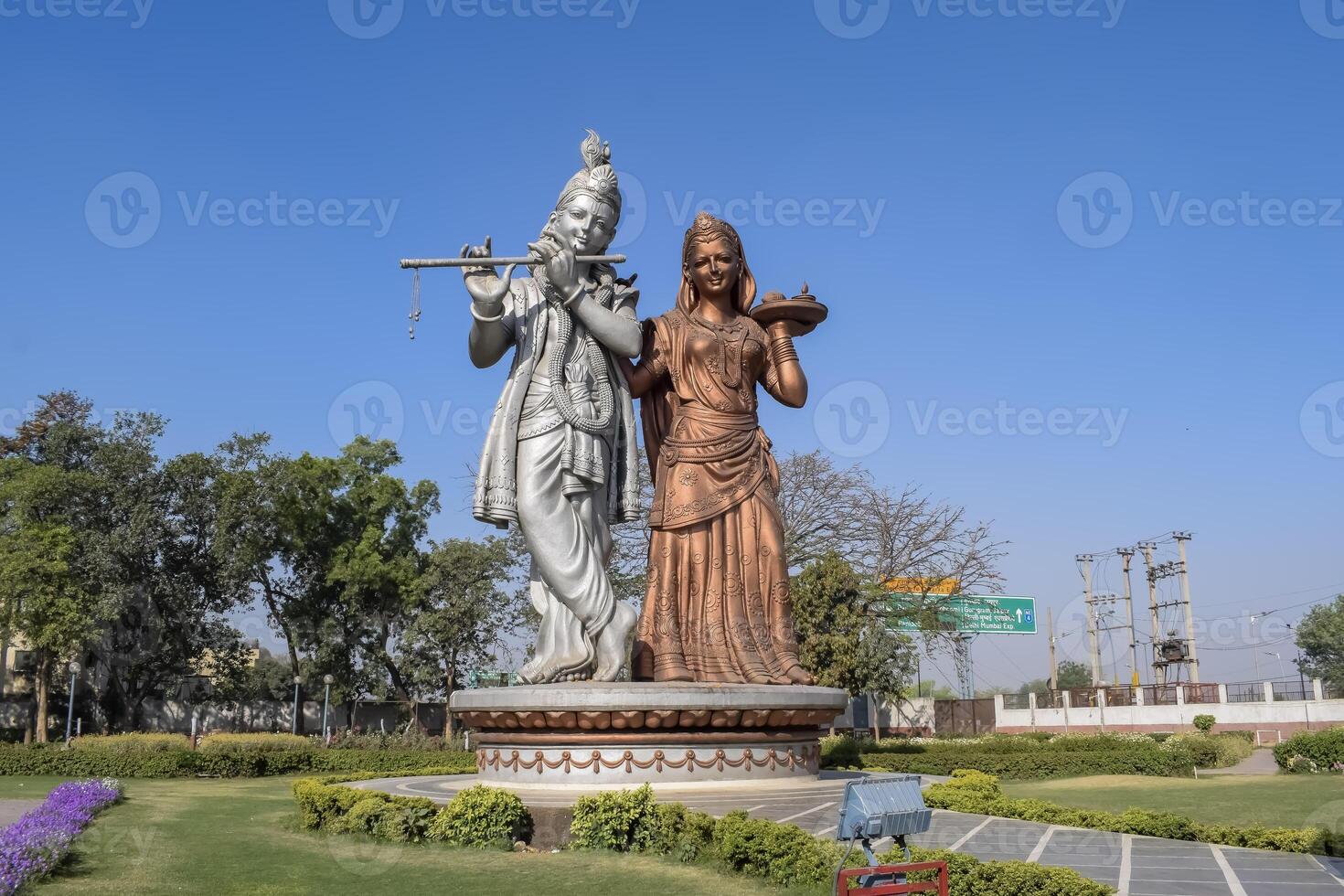 Big statue of Lord Radha Krishna near Delhi International airport, Delhi, India, Lord Krishna and Radha big statue touching sky at main highway Mahipalpur, Delhi photo