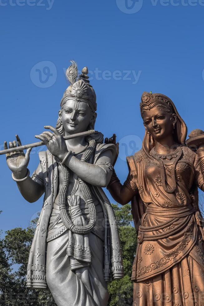 Big statue of Lord Radha Krishna near Delhi International airport, Delhi, India, Lord Krishna and Radha big statue touching sky at main highway Mahipalpur, Delhi photo