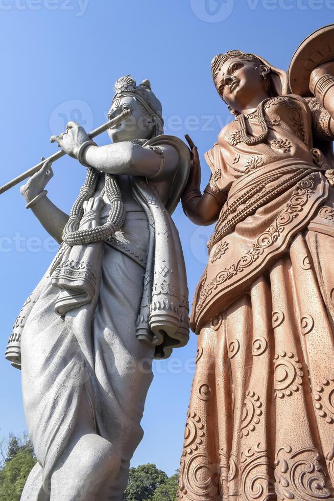 Big statue of Lord Radha Krishna near Delhi International airport, Delhi, India, Lord Krishna and Radha big statue touching sky at main highway Mahipalpur, Delhi photo