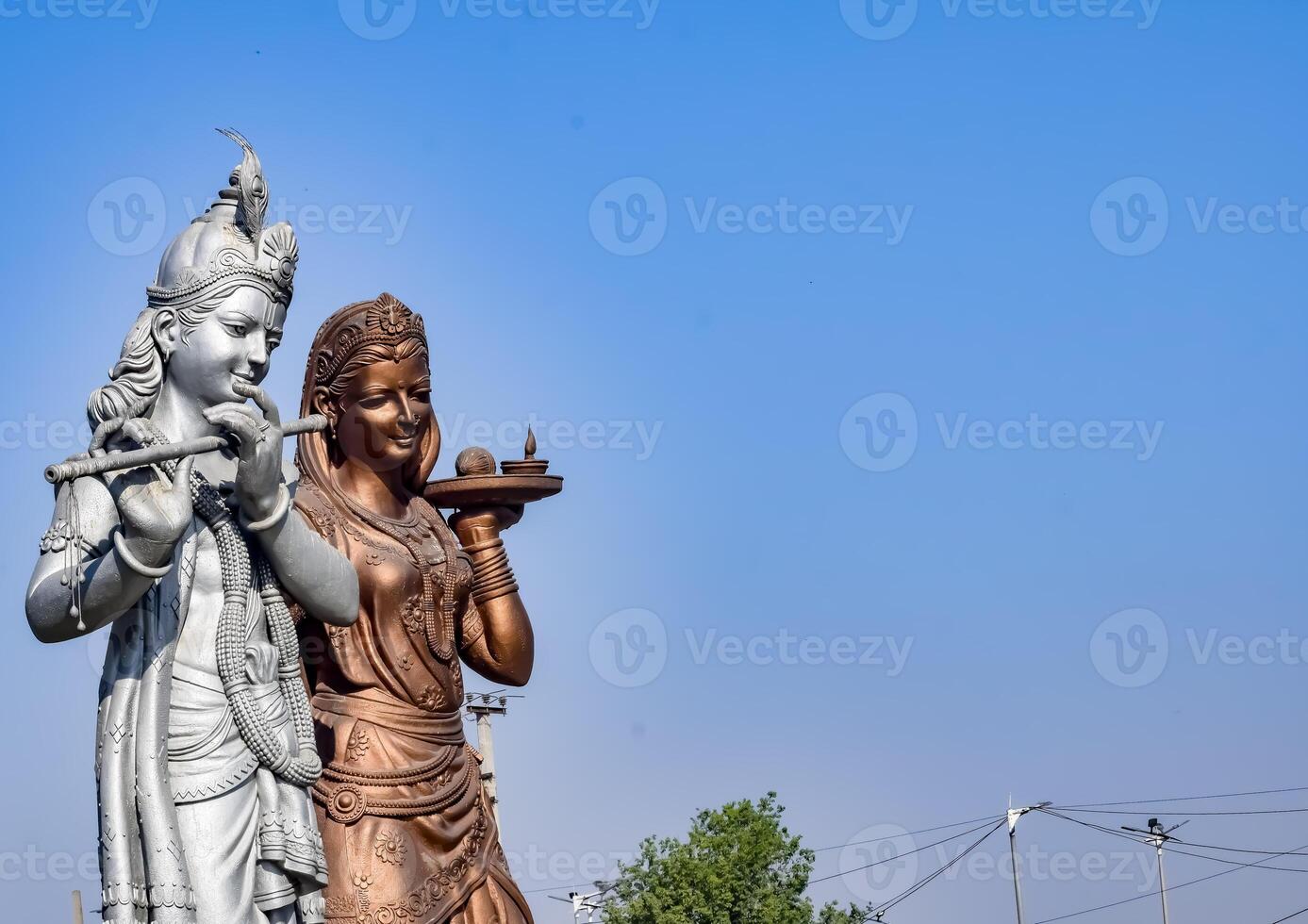 Big statue of Lord Radha Krishna near Delhi International airport, Delhi, India, Lord Krishna and Radha big statue touching sky at main highway Mahipalpur, Delhi photo
