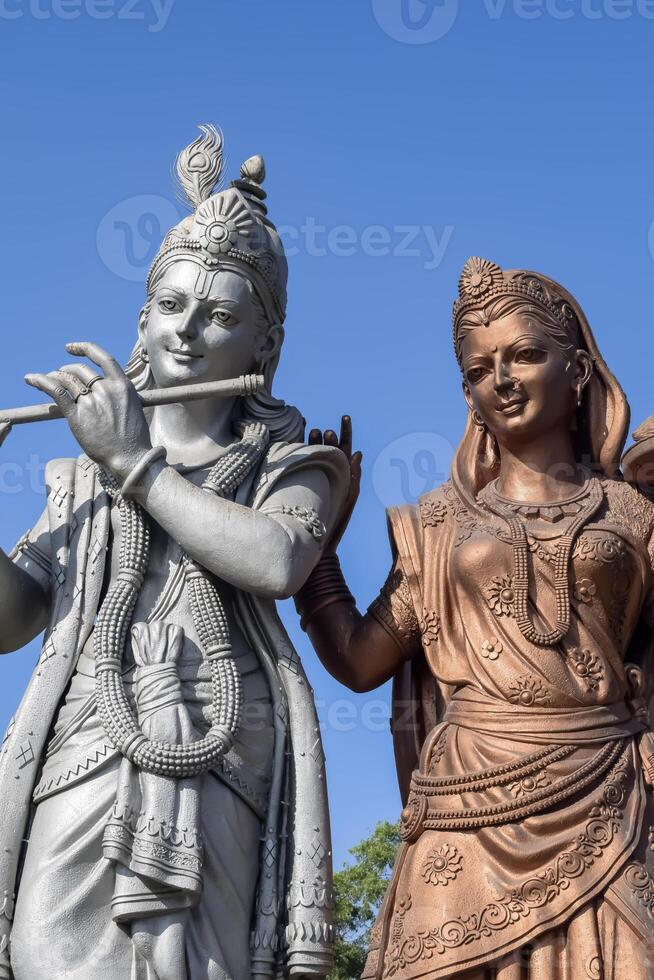 Big statue of Lord Radha Krishna near Delhi International airport, Delhi, India, Lord Krishna and Radha big statue touching sky at main highway Mahipalpur, Delhi photo