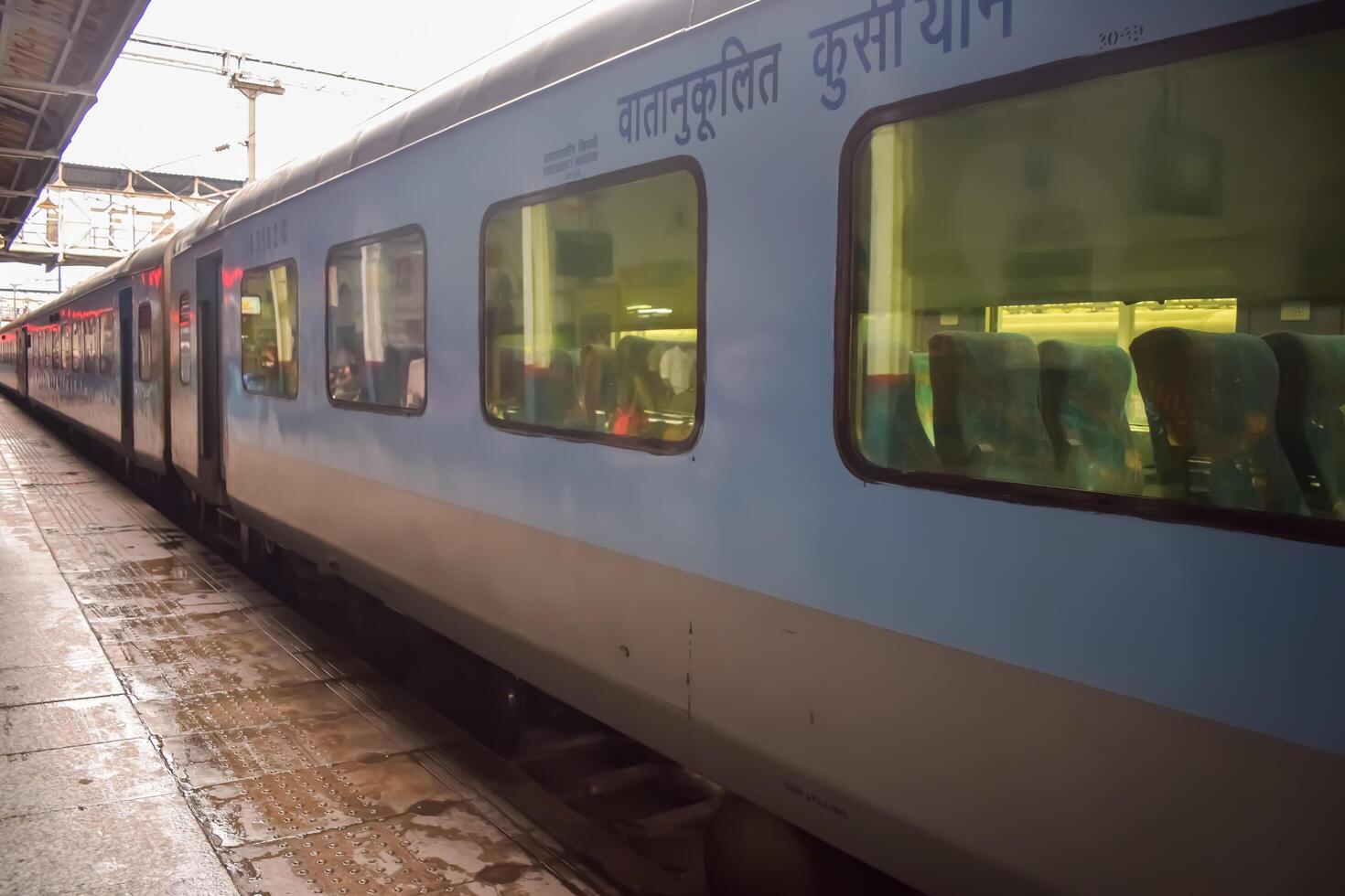 Amritsar, India, May 03 2024 - Indian railway train at Amritsar railway station platform during morning time, Colourful train at Amritsar, Punjab railway station photo