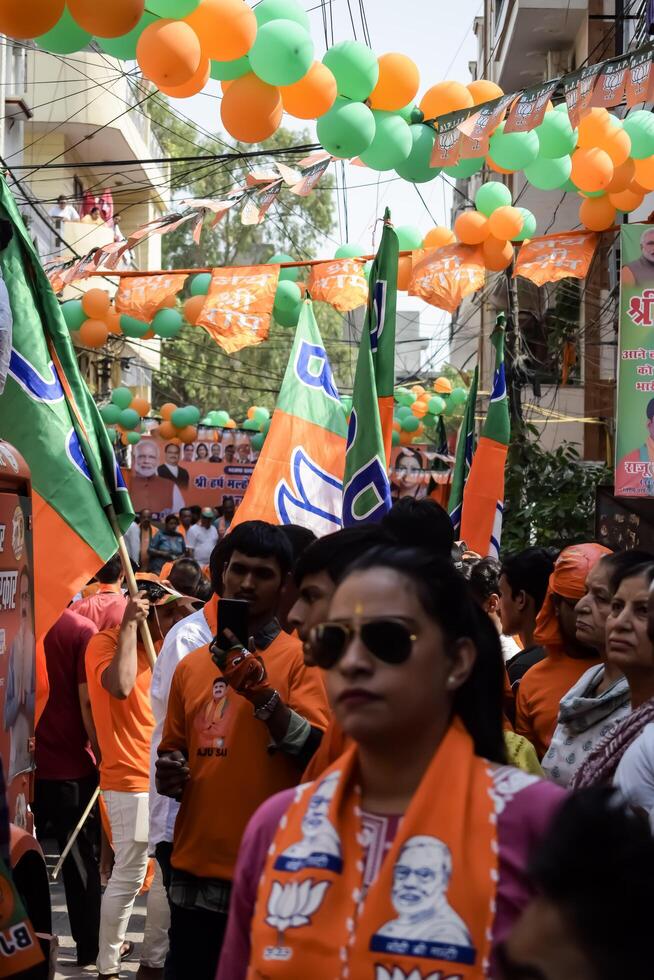 New Delhi, India - May 17 2024 - Thousands of people collected during Prime Minister Narendra Modi BJP road show, people during PM Modi big election rally in the capital photo