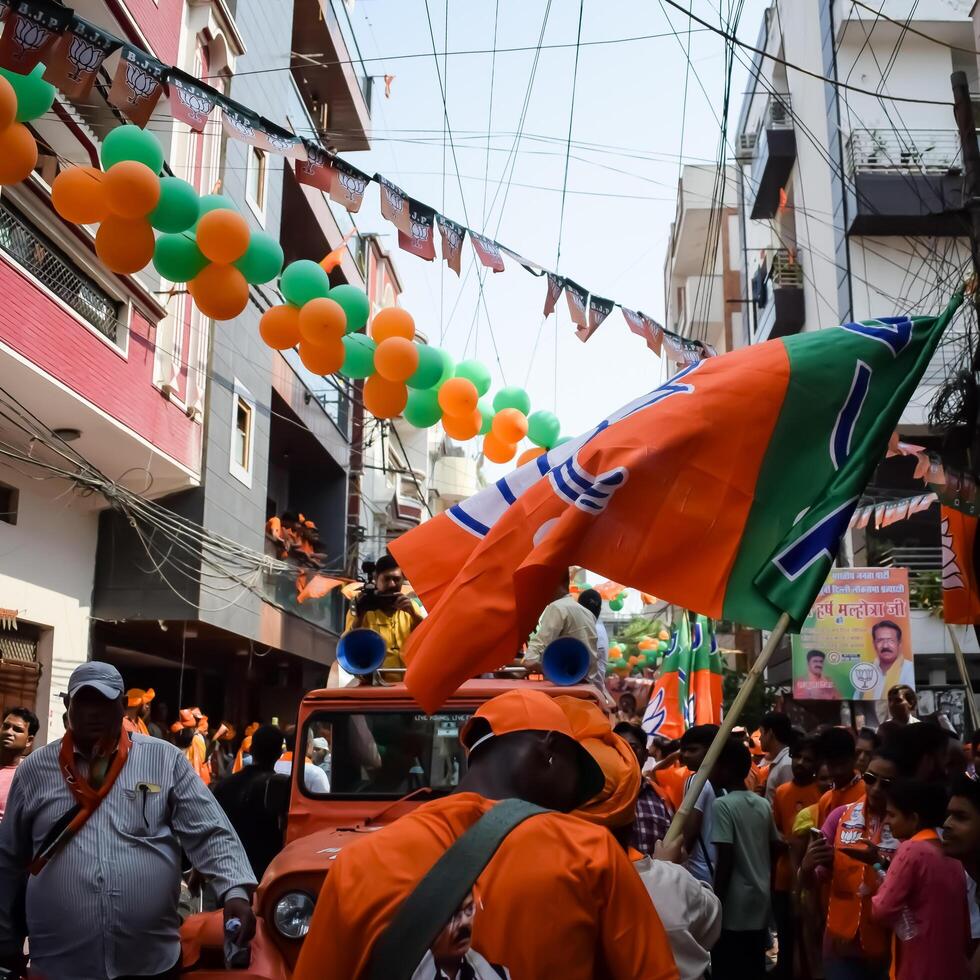 New Delhi, India - May 17 2024 - Thousands of people collected during Prime Minister Narendra Modi BJP road show, people during PM Modi big election rally in the capital photo