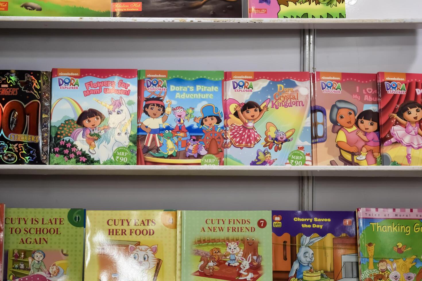 New Delhi, India, February 17 2024 - Variety of Books on shelf inside a book-stall at Delhi International Book Fair, Selection of books on display in Annual Book Fair at Bharat Mandapam complex photo