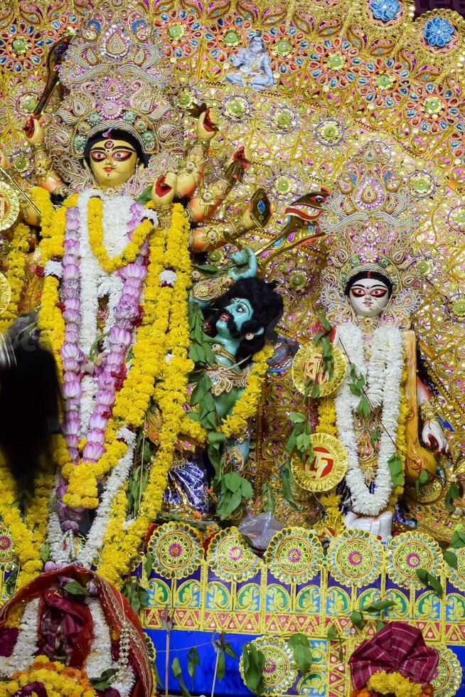 Goddess Durga with traditional look in close up view at a South Kolkata Durga Puja, Durga Puja Idol, A biggest Hindu Navratri festival in India photo